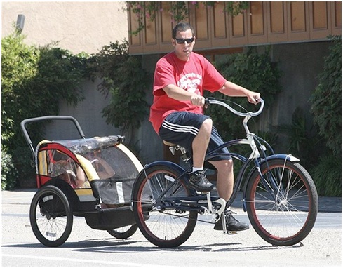 Adam Sandler bicycling