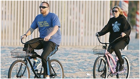 Heidi Klum bicycling with her boy friend