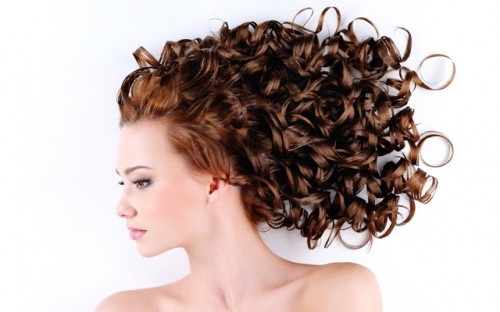 woman with beautiful long curly hairs